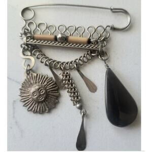 VINTAGE SILVERTONE HEMATITE MULTI CHARM BROOCH